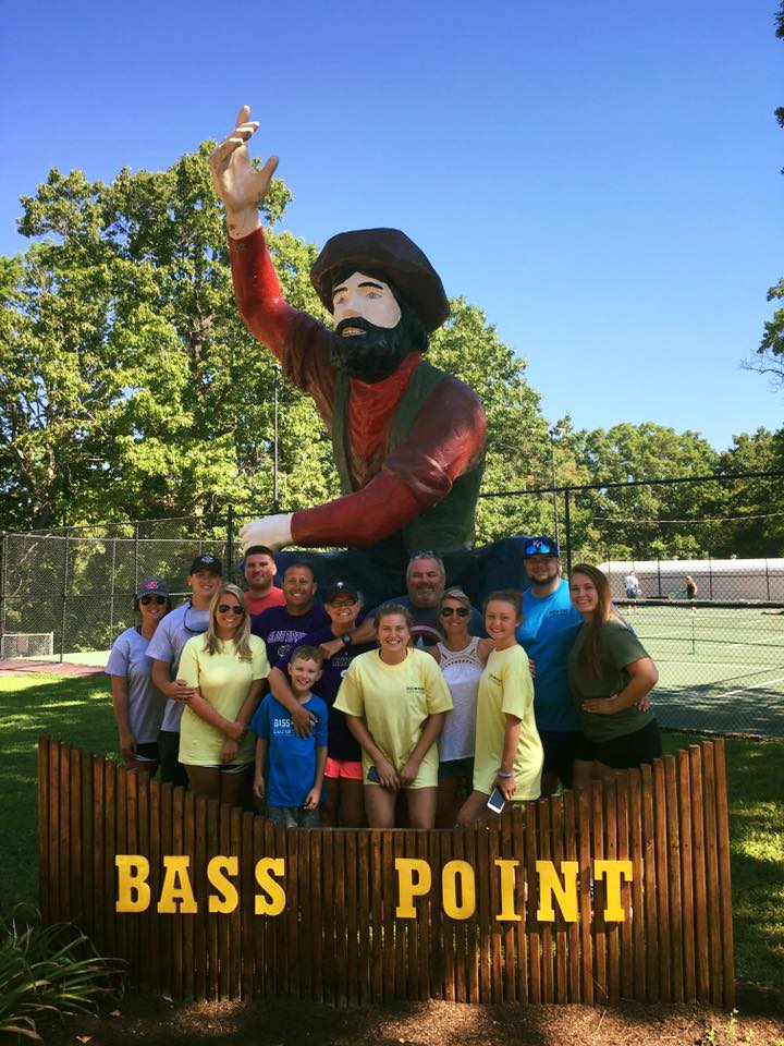 Family at Bass Point Sign